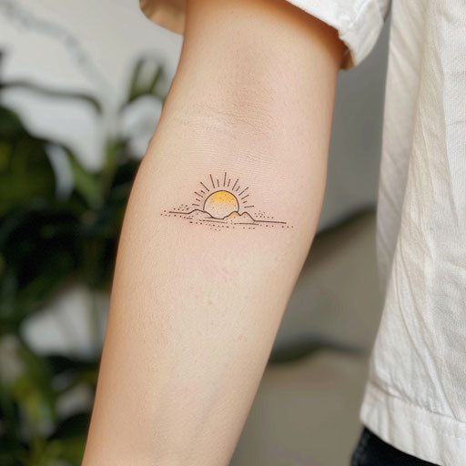 Tiny rising sun with delicate pastel shades