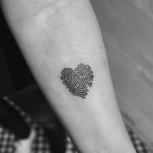 Stark graphic stencil heart fingerprint tattoo in black