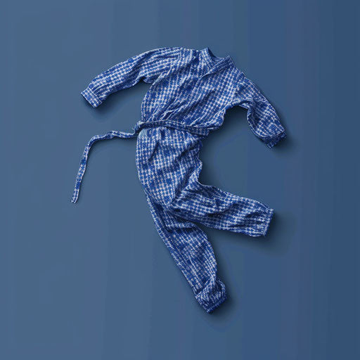 Realistic pajama day clipart on flat indigo background