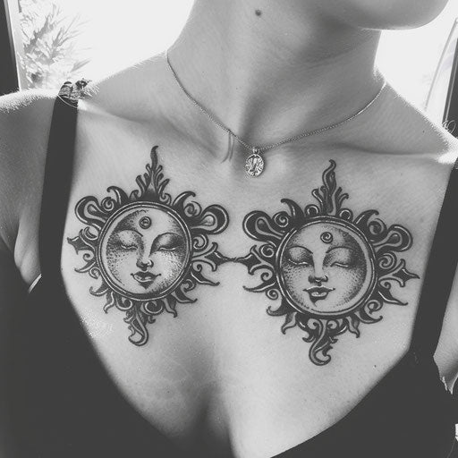 Matching sister tattoos of tribal suns and moons on chest