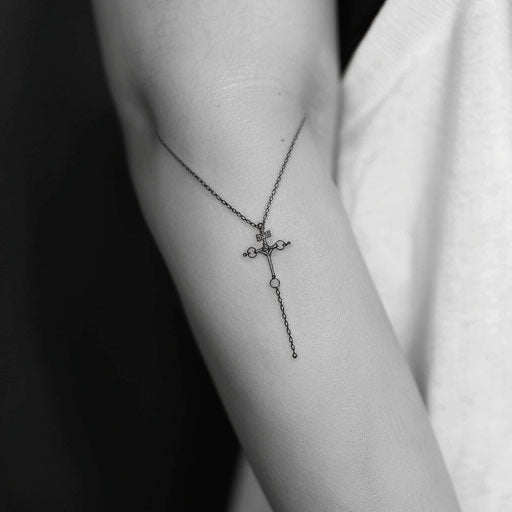 Elegant cross in minimalist rosary tattoo design