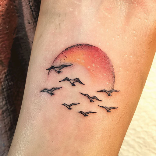 Elegant sunset tattoo with birds flying on white background