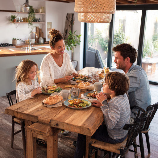A happy family enjoys a meal at their modern home