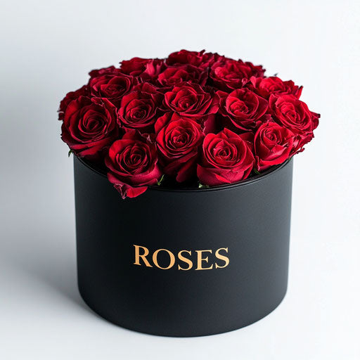 Round box with red roses and logo "ROSES" in gold letters