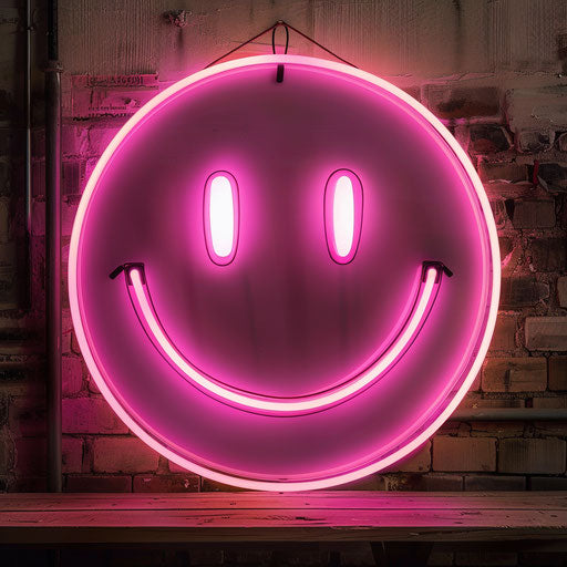 Pink neon sign of the happy emoji glowing in bright light