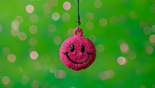 Eco-Friendly Pink Smiley Face for Green Campaigns